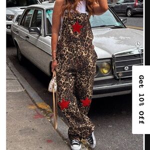 Dressed in LALA Leopard Jumpsuit with Red Stars